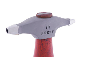 Close-up of the Fretz HMR-15 texturing hammer head showing its two concave circle faces