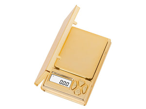 A gold-colored digital mini scale with a shiny finish, featuring a digital display and a gold-colored body.| Digital Scales