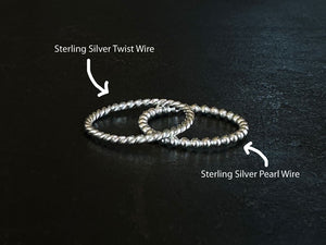 925 Silver Twist wire for jewellery making on a black surface