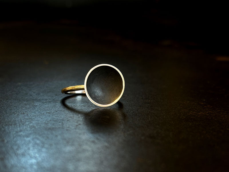 925 silver ring with oxidised black centre on a dark surface | Liver of Sulphur Gel