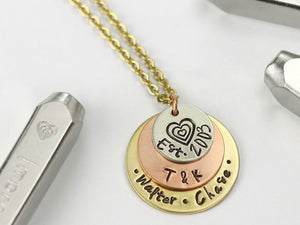 ImpressArt Multi Heart Signature Design Stamped pendant in silver, copper and brass .