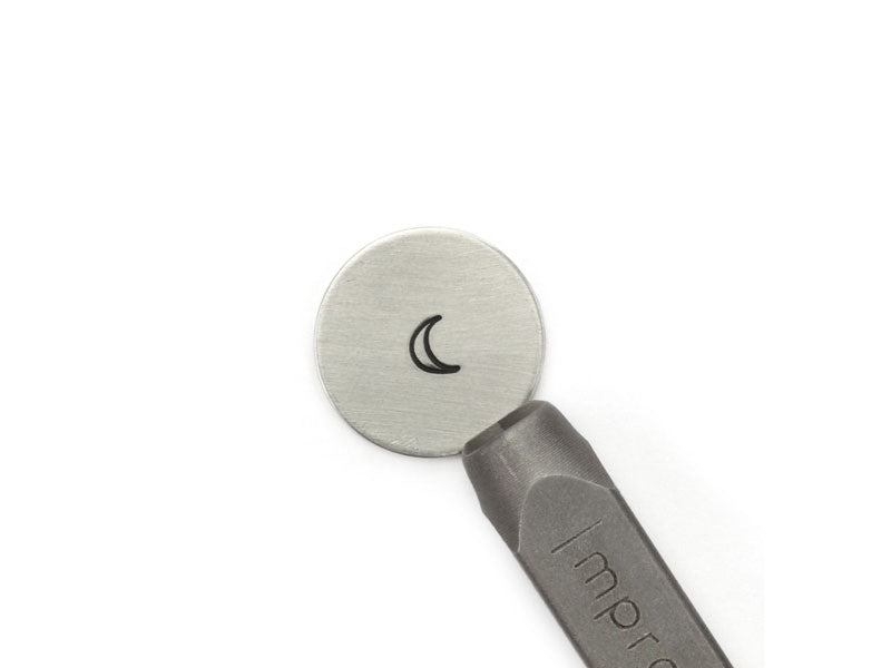 A close-up of a metal stamp with a crescent moon design, branded with the name 'ImpressArt', against a white background.
