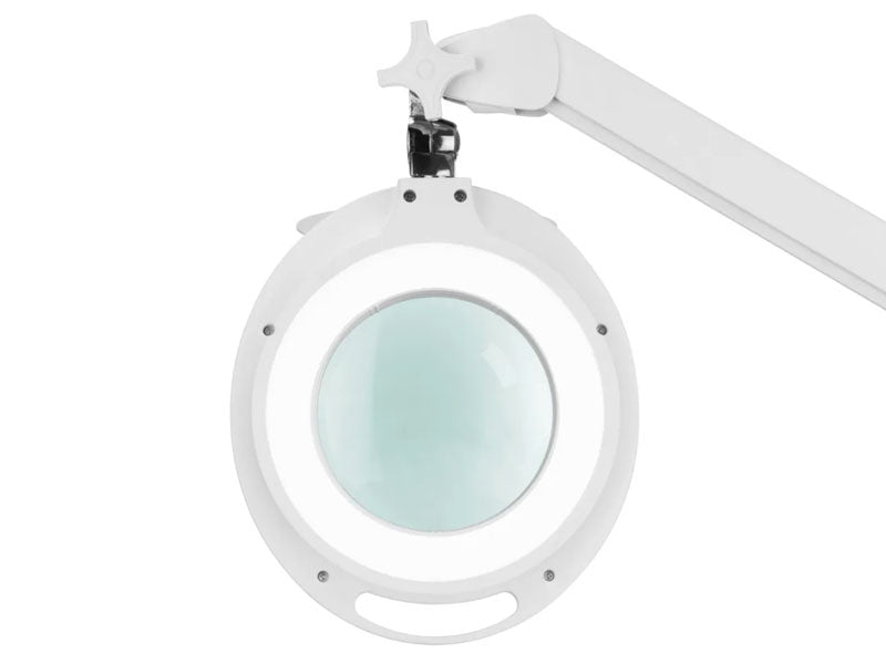 White magnifying lamp with adjustable arm on a white background | glass magnifying glass with light
