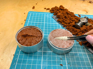 Removing a shell from the Delft clay after pressing the mould