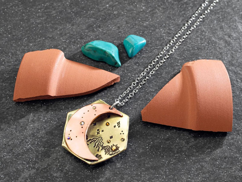 Desert mountains stamped onto brass and copper pendant | Jewellery Supplies